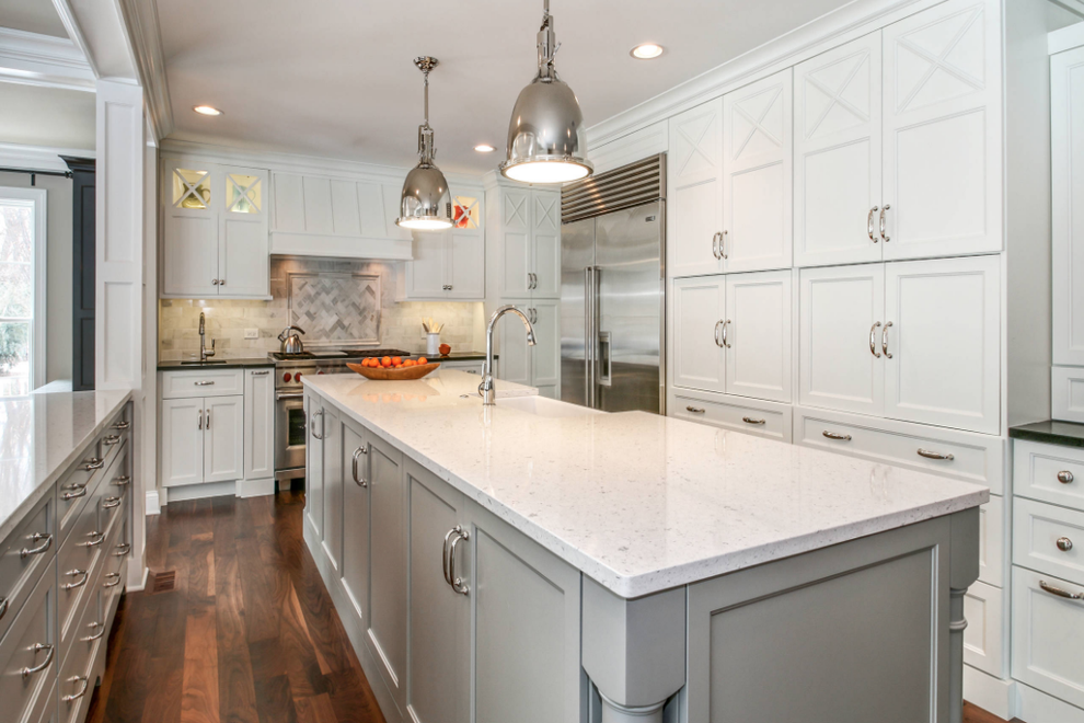 bianco river tops dark wood floor gray island white kitchen cabinets marble backsplash