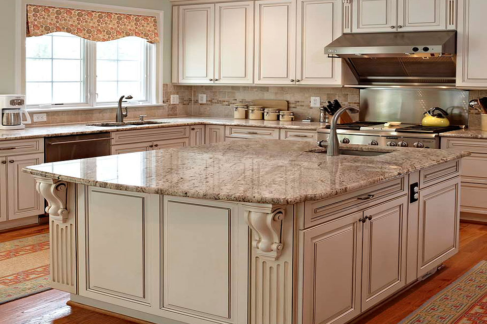 bianco romano granite counters cherry wood floor cream cabinetry