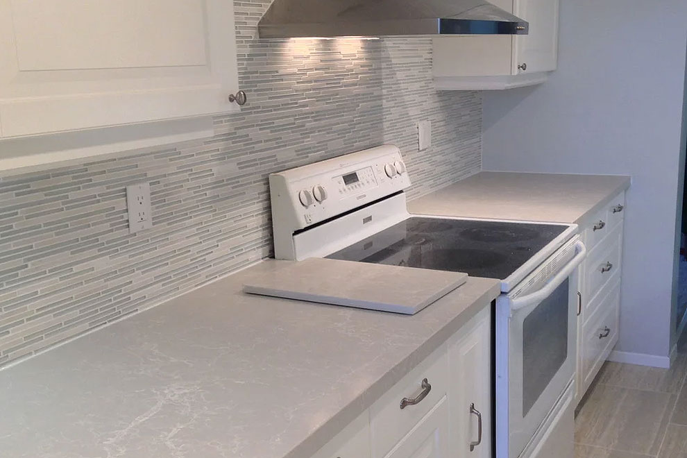 caesarstone alpine mist quartz kitchen countertops white cabinets