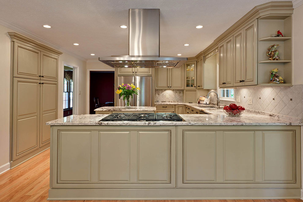 delicatus granite countertop medium tone wood floor cream cabinets compare marble