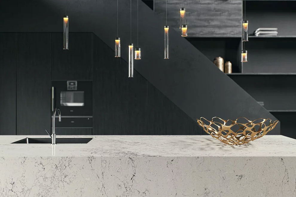 caesarstone montblanc quartz countertops black cabinets waterfall edge