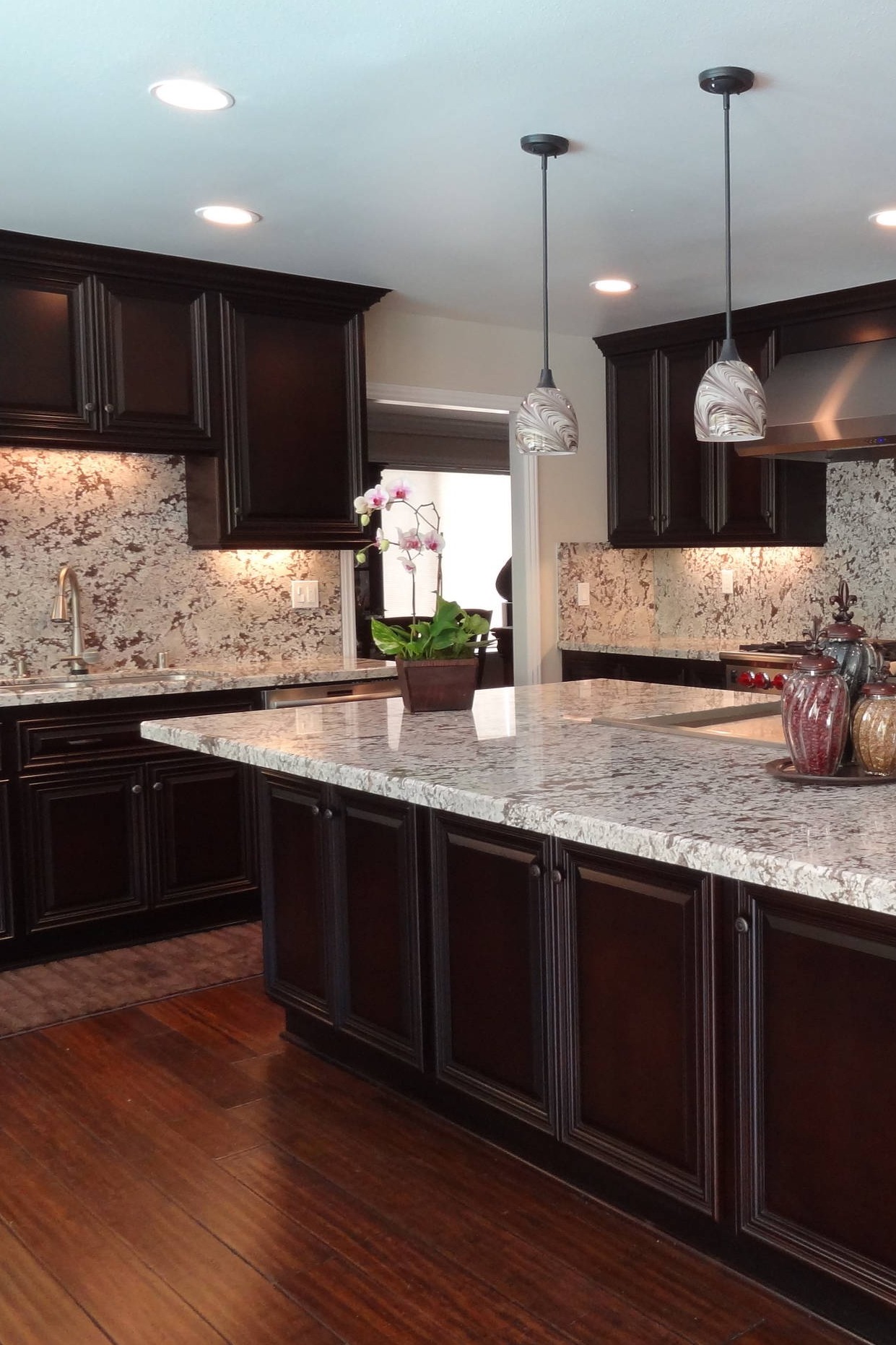 Bianco Antico Granite Countertop Full Height Backsplash Dark Cabinet Plank Hardwood Floor