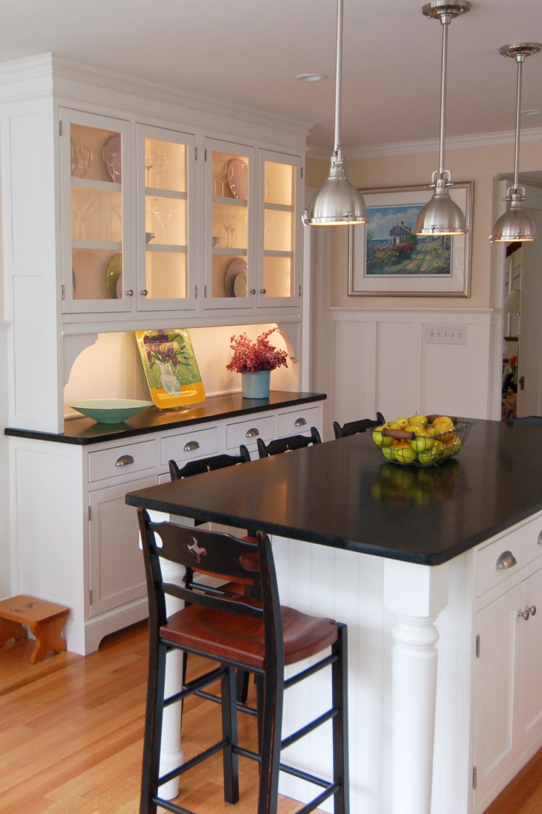 Black Honed Granite Countertop White Cabinet Backsplash Light Hardwood Floor 1