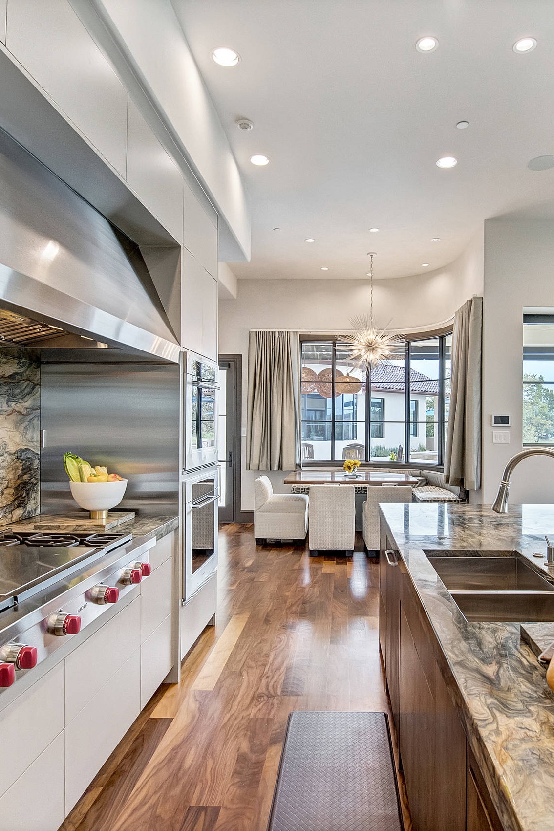 Fusion Quartzite Countertops Full Height Backsplash White Kitchen Brown Island Cabinet Hardwood Floor