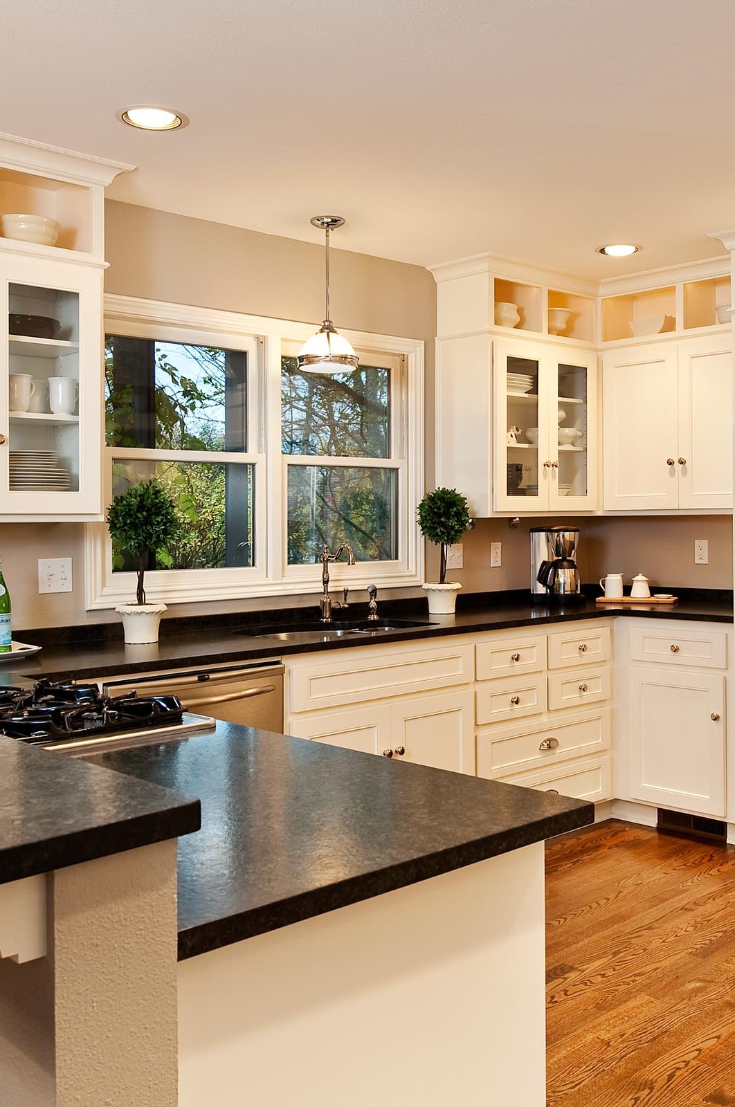 Honed Black Granite Countertops White Cabinets Dark Walnut Stained Hardwood Floor 1