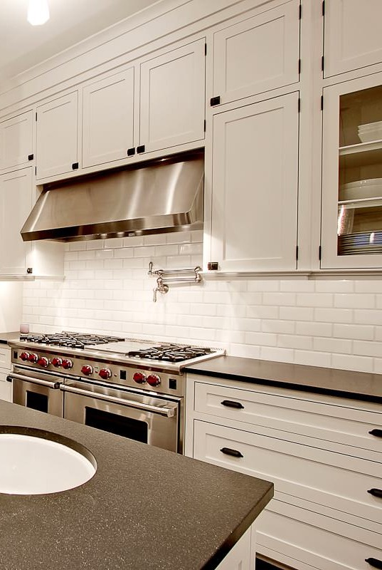 Honed Black Granite Countertops White Subway Tile Backsplash Cabinets 1