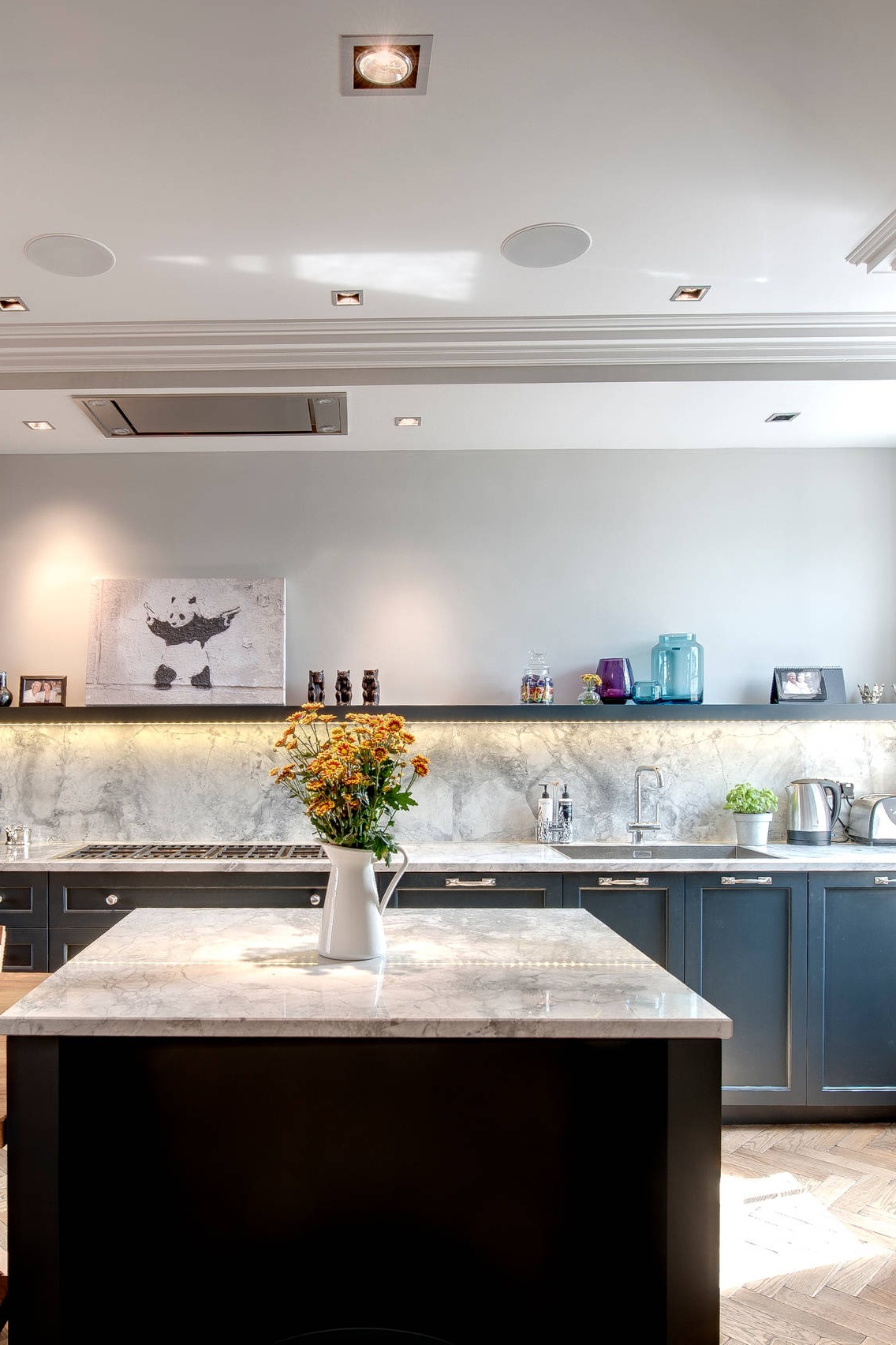 Viscount White Countertops Dark Gray Cabinets Full Height Granite Backsplash Hardwood Floors 1