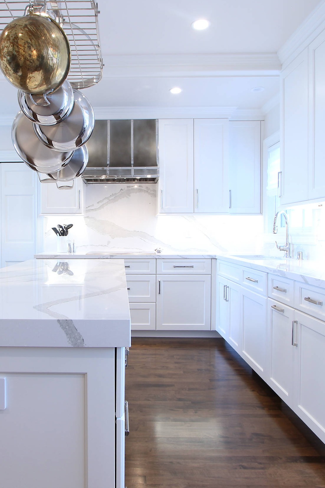 White Quartz Full Height Backsplash Counters Cabinets Dark Hardwood Flooring