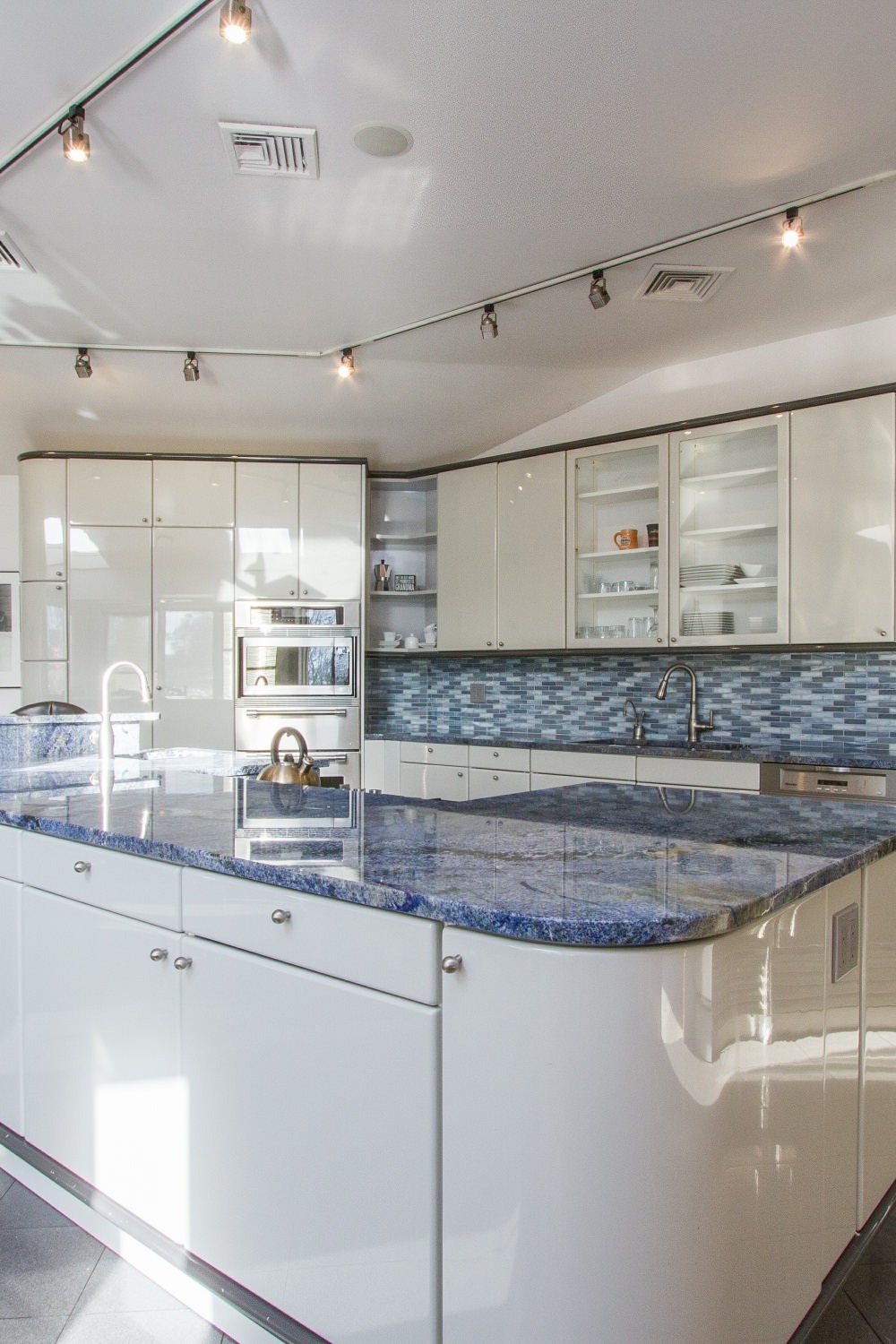 Blue Bahia Granite Countertop White Cabinet Mosaic Tile Backsplash Gray Floor