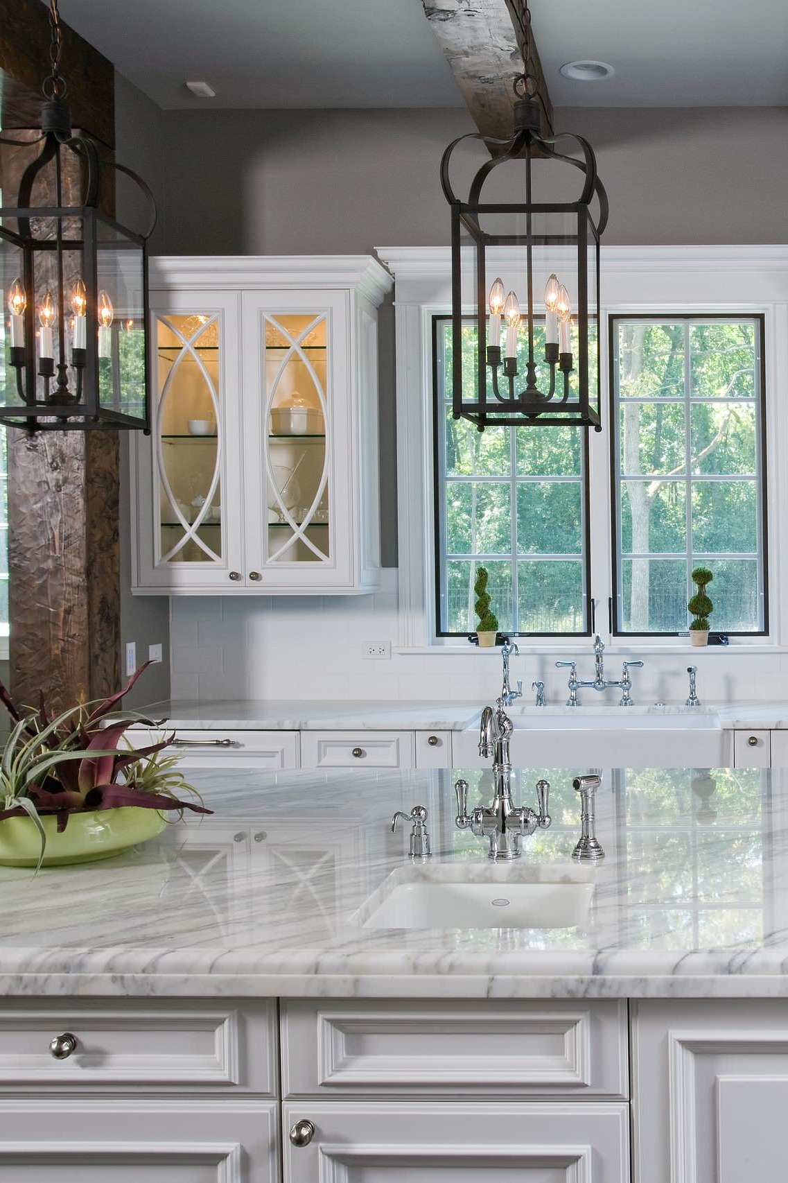 Dark Hardwood Floor White Cabinets Marble Countertops Subway Style Backsplash