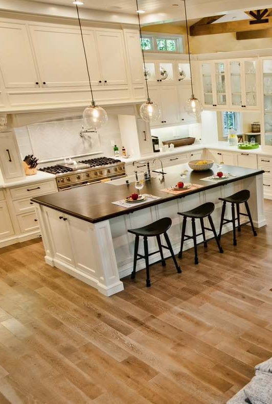 Two Different Colored Countertops White Cabinets Backsplash Natural Hardwood Floor
