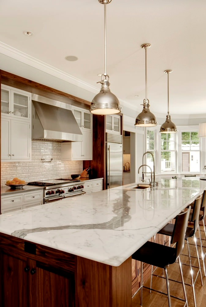 Two Tone Cabinetry Marble Island Quartz Kitchen Countertops Mosaic Tile Backsplash Natural Color Hardwood Floor