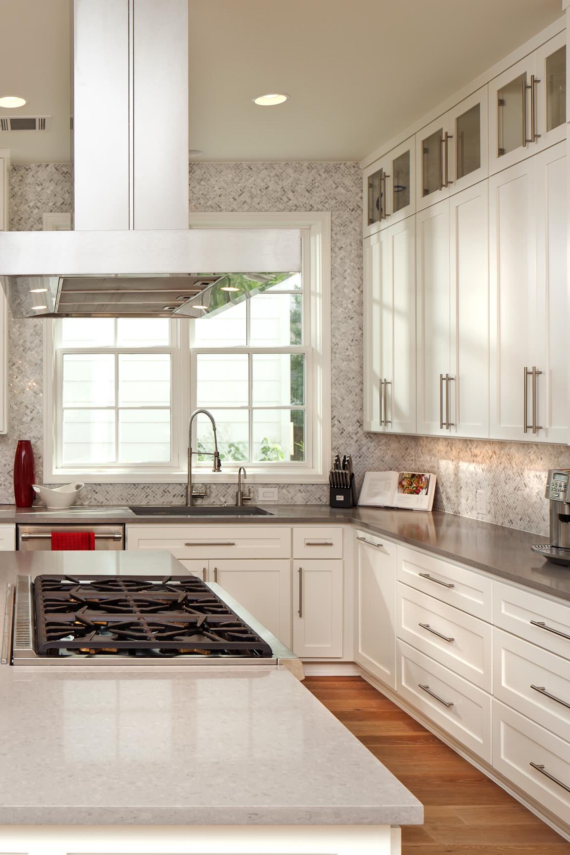 Two Tone Quartz Countertops White Cabinets Mosaic Tile Backsplash Hardwood Floor