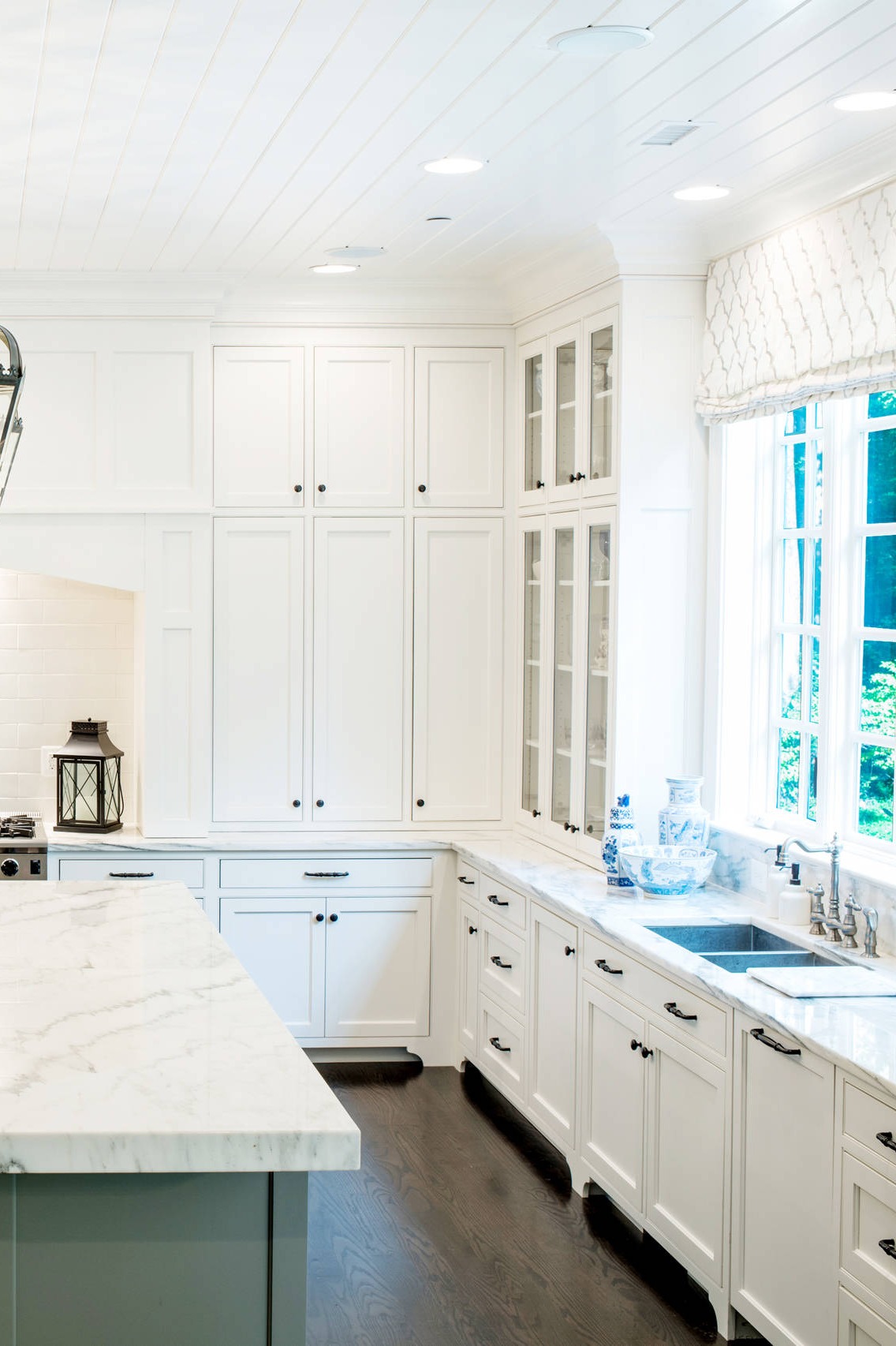 White Kitchen Green Island Cabinets Marble Countertops Dark Hardwood Floor Subway Tile Backsplash
