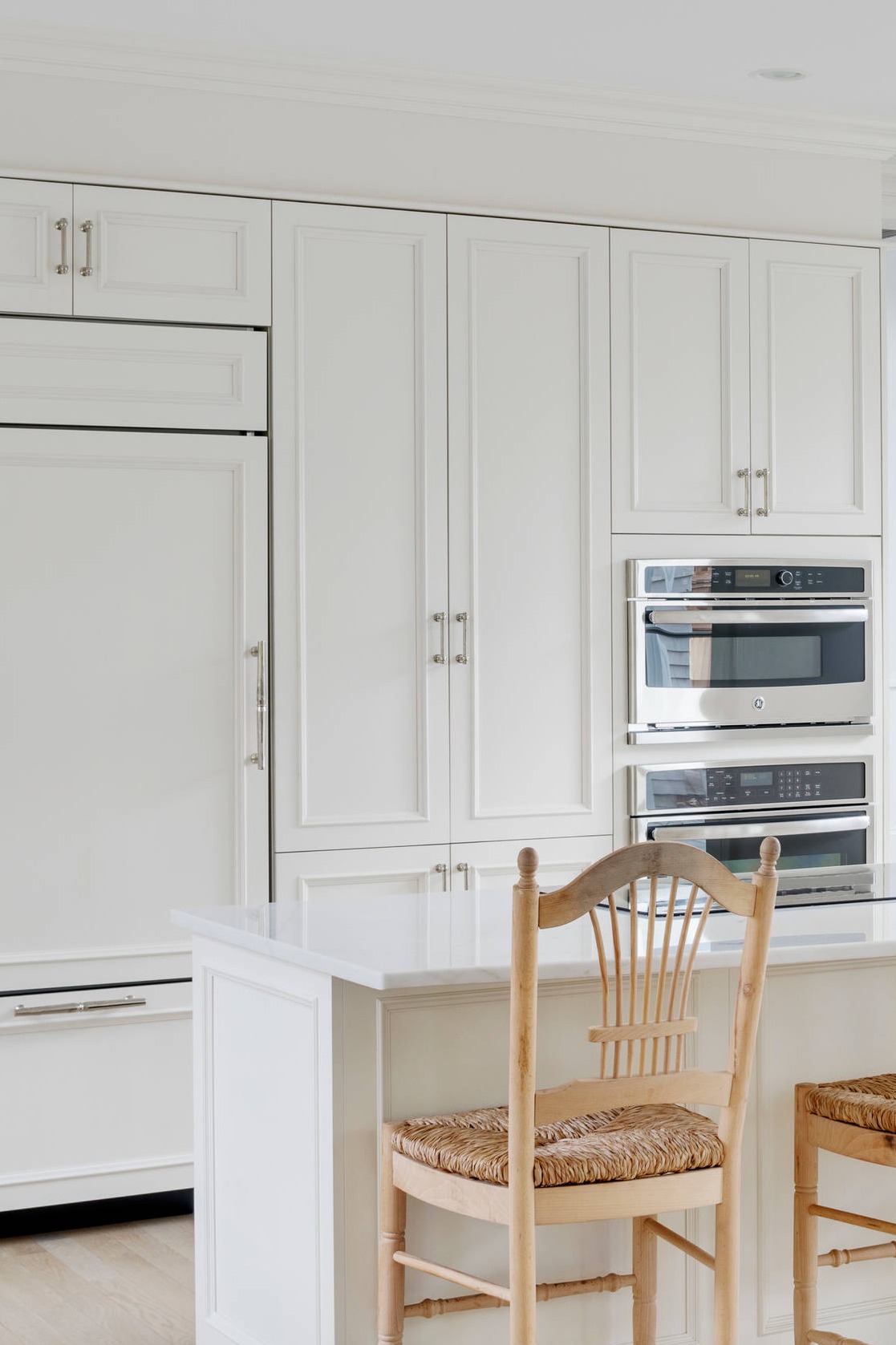 White Marble Countertops White Cabinets Light Hardwood Floors