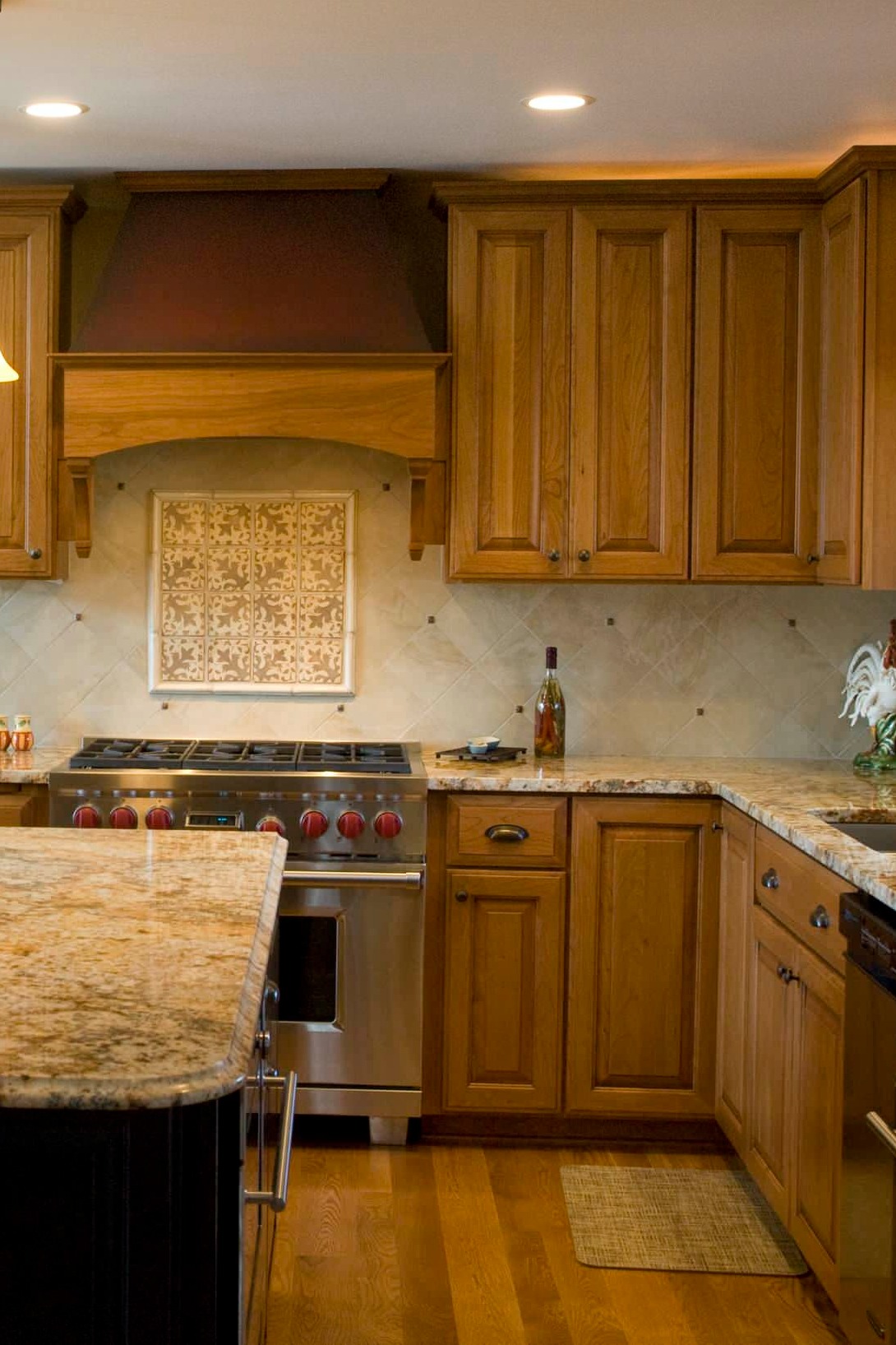 Fantasy Gold Granite Countertop Oak Cabinet Beige Tile Backsplash Dark Hardwood Floor
