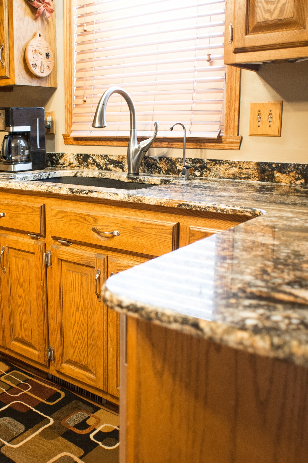 Magma Gold Granite Countertop Backsplash Oak Cabinet Hardwood Floor