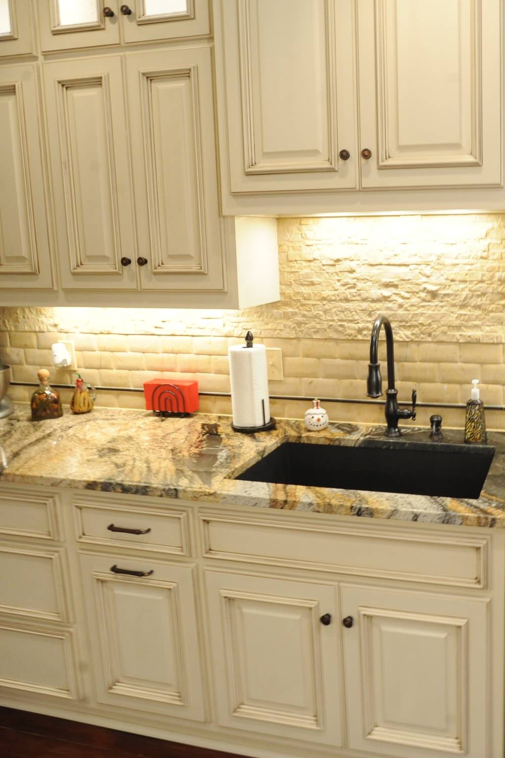 Magma Gold Granite Countertop White Cabinet Cream Backsplash Tile Dark Hardwood Floor