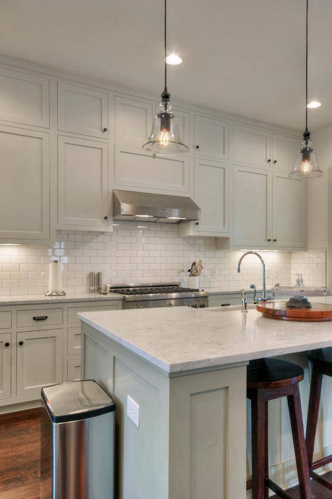 Mystery White Granite Countertops Subway Style Backsplash Cabinets Dark Hardwood Floor