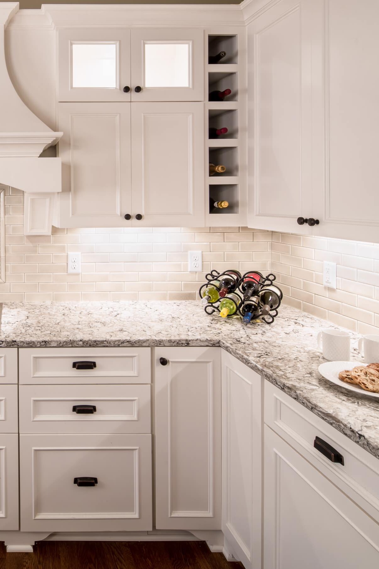 Quartz Kitchen Countertops White Cabinets Subway Style Tile Backsplash Dark Hardwood Floor