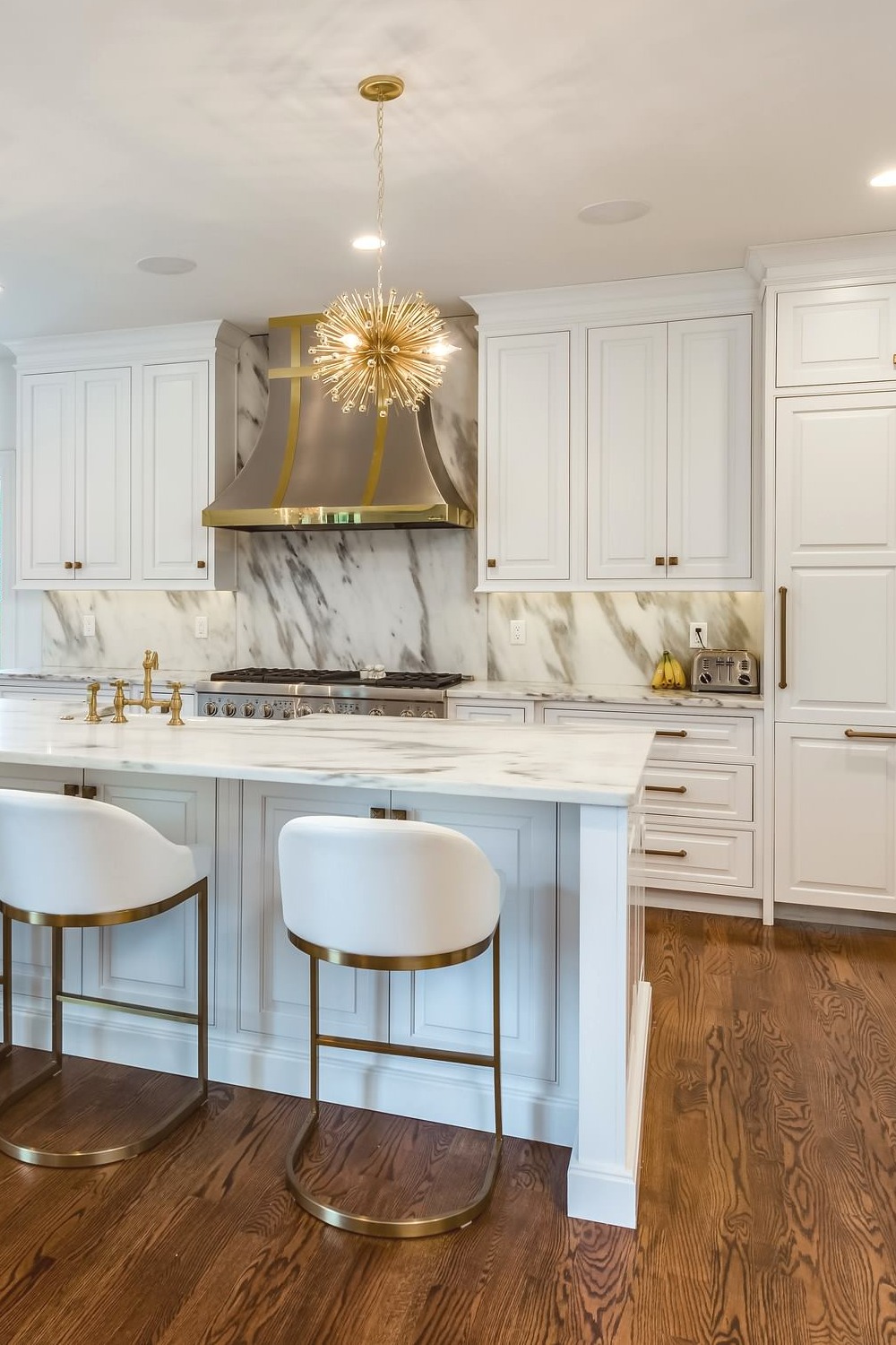 White Marble Countertop Cabinet Full Height Backsplash Dark Hardwood Floor