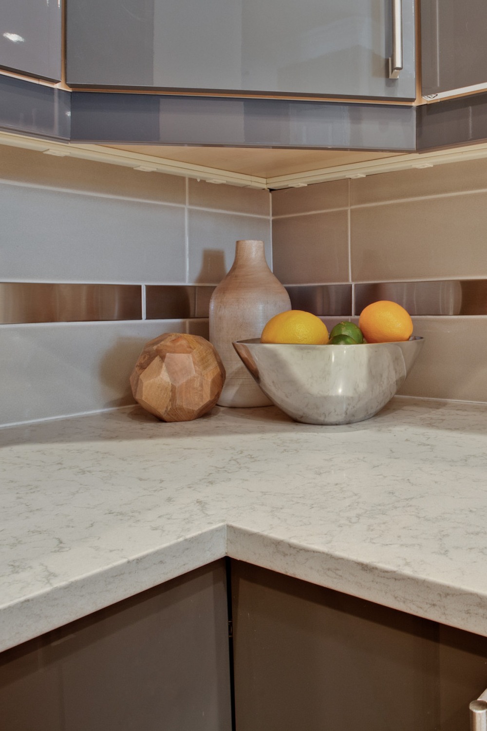 Handstone Aspen Quartz Countertops Gray Cabinets Off White Subway Style Backsplash Tile