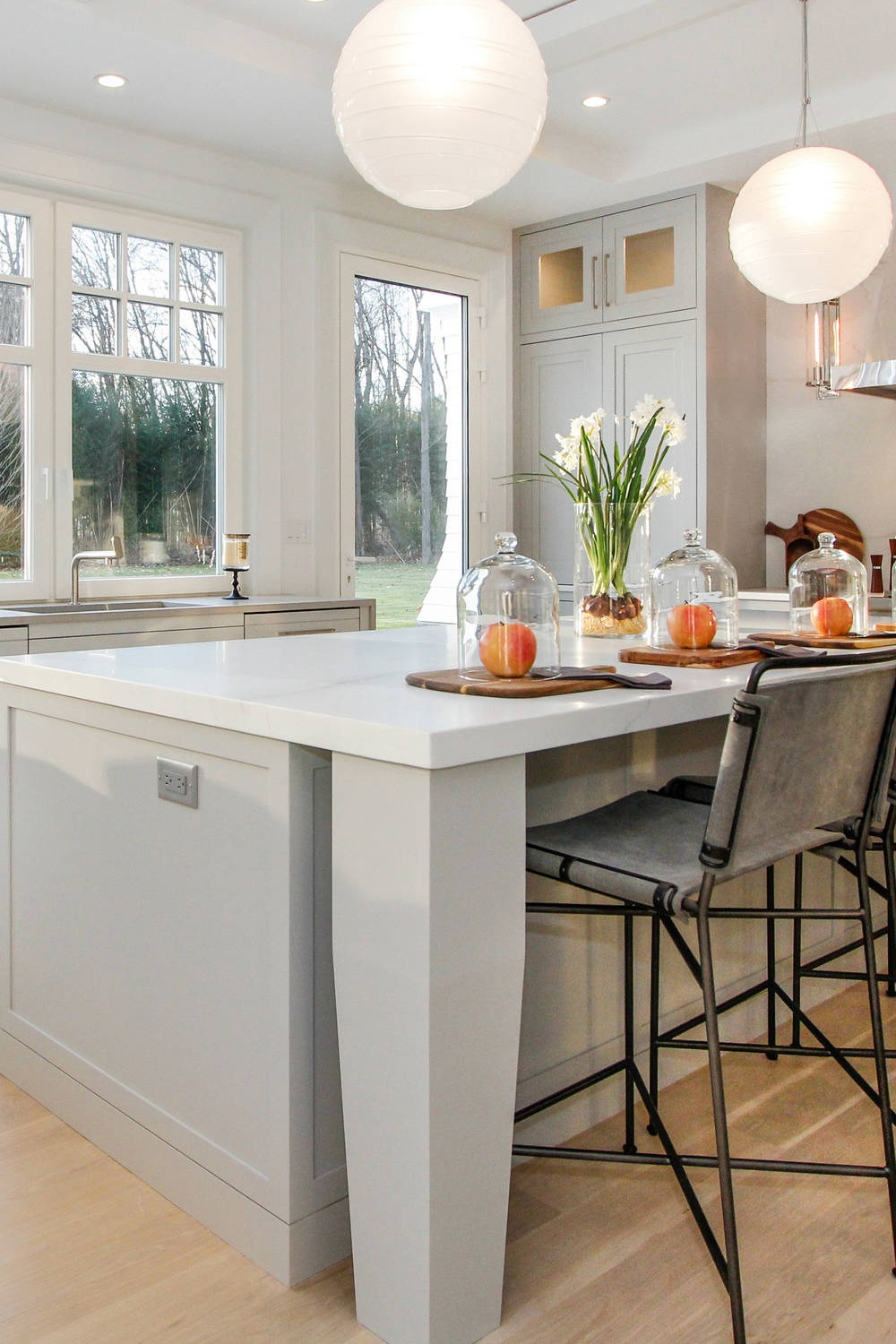 Light Gray Cabinetry White Quartz Countertops Oak Wood Floor