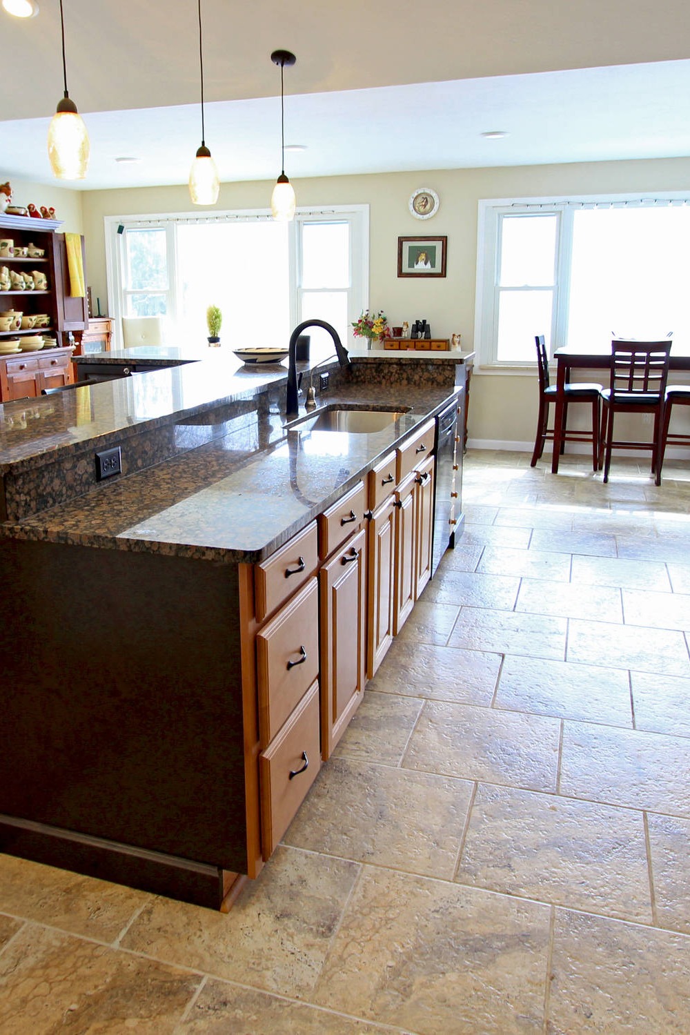 Open Concept Kitchen Baltic Brown Granite Countertop Backsplasg Beige Natural Stone Floor Tile