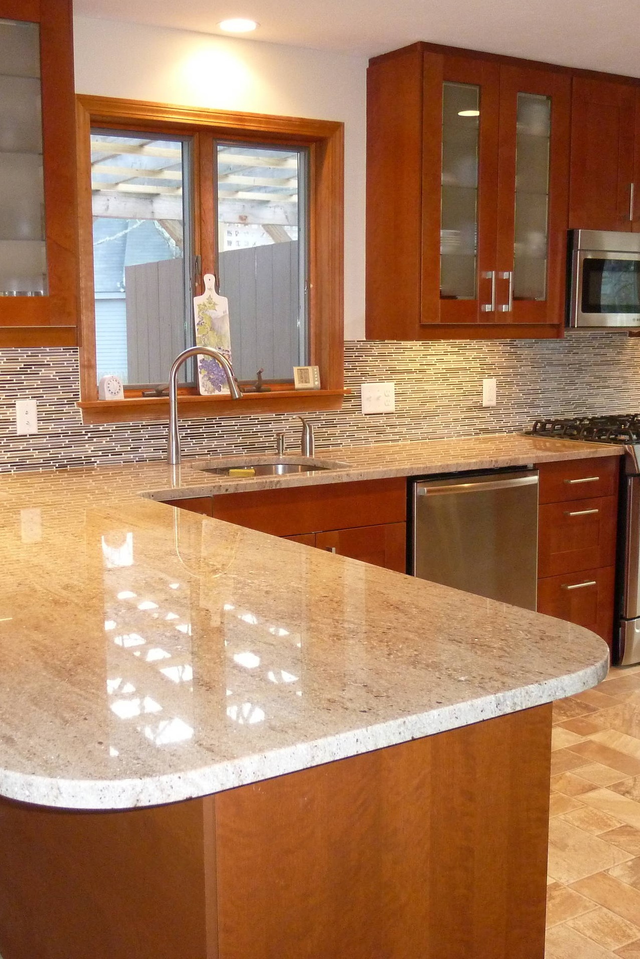 Warm Toned Travertine Flooring Astoria Granite Counters Dark Cherry Cabinets Mosaic Backsplash