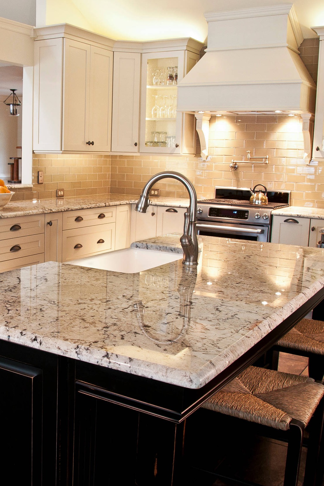 Almond-Color-Glass-Subway-Tile-Backsplash-White-Galaxy-Granite-Cabinets-Porcelain-Floor-2.jpg