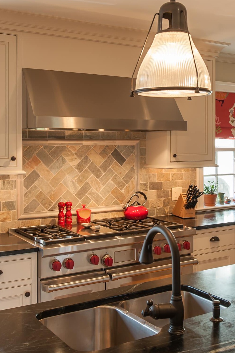 Brick Style Travertine Backsplash White Cabinets Dark Brown Granite Countertops Medium Dark Hardwood Floor