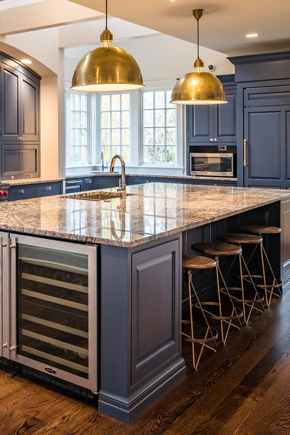 Blue Kitchen Cupboards White Granite Countertops Dark Hardwood Flooring Pendant Lights