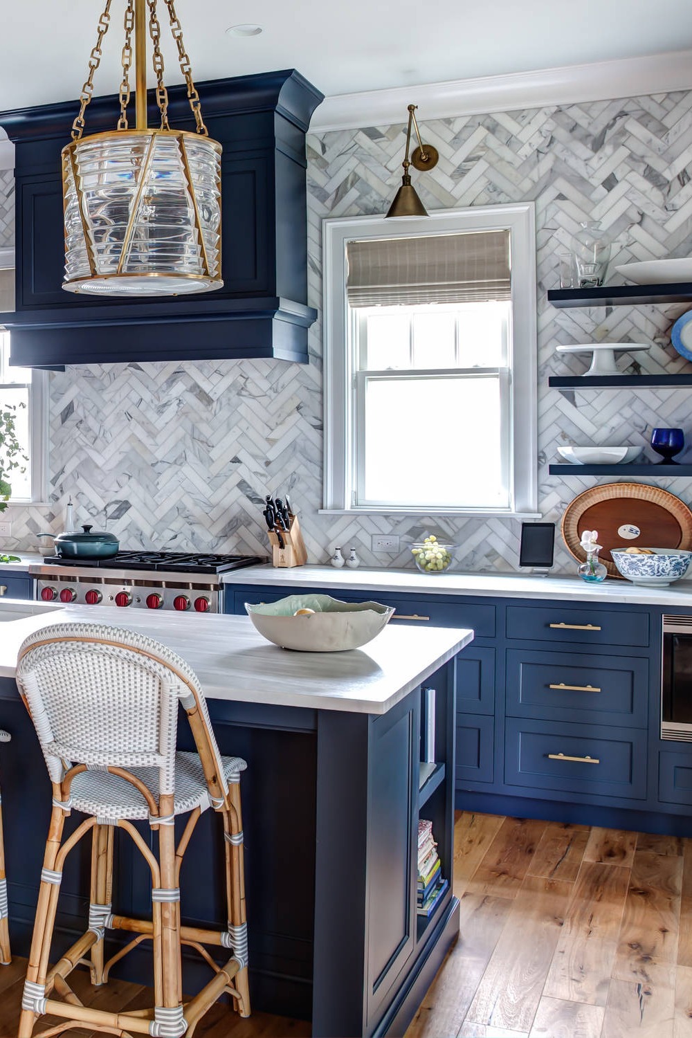Blue Shaker Cabinets White Marble Backsplash Tile Quartz Countertops Wood Floor