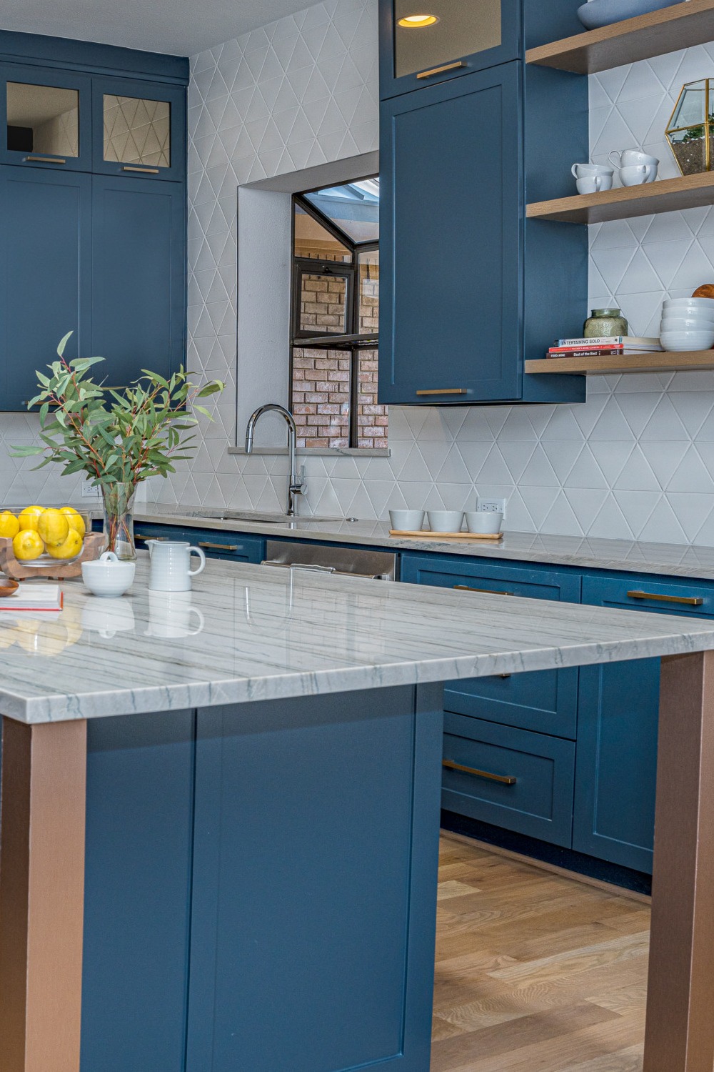 Blue Shaker Cabinets White Quartzite Countertops Backsplash Tile Hardwood Floor