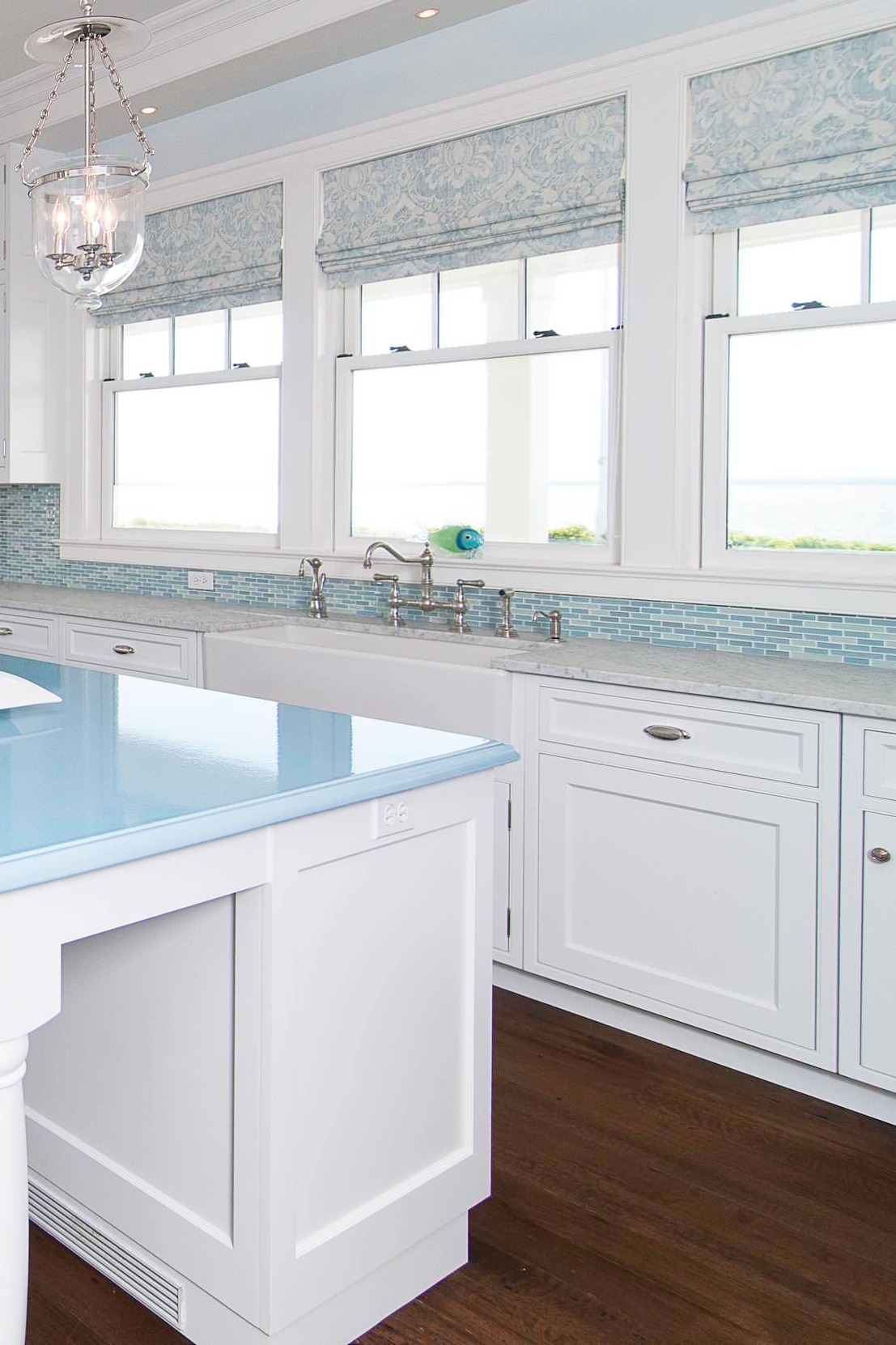 Dark Brown Hardwood Floor Blue Countertop Mosaic Tile Backsplash White Cabinets