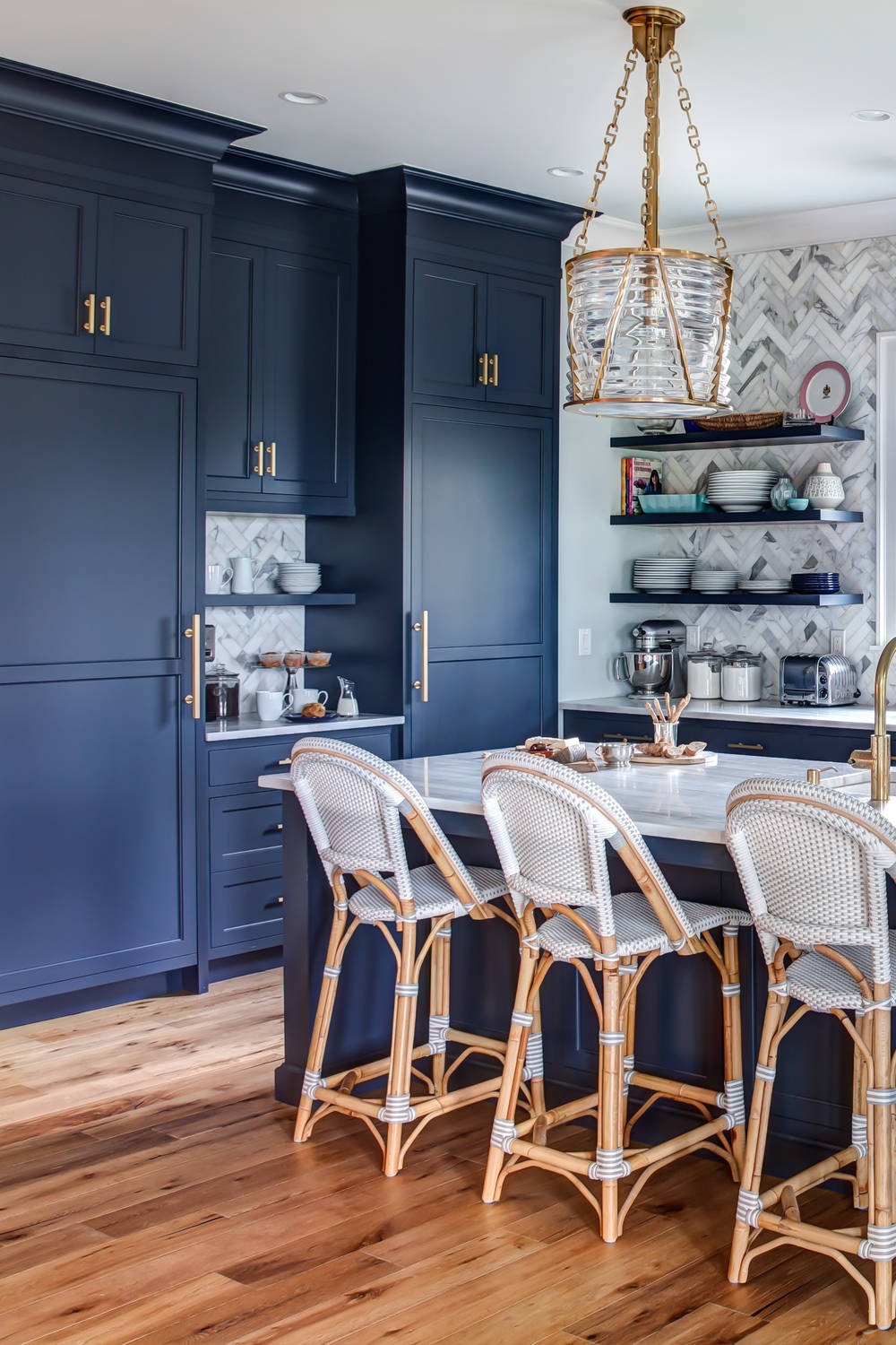 Glossy Blue Kitchen Cabinets White Quartzite Countertops Multi Colored Porcelain Backsplash Natural Wood Floor