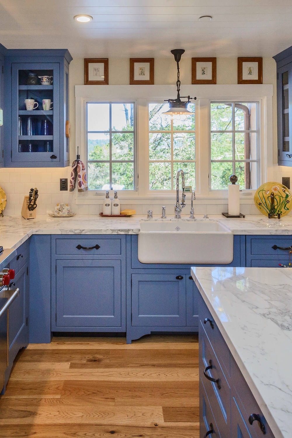 Shaker Blue Cabinets White Marble Countertops Tile Backsplash Farmhouse Sink Dark Wood Floor