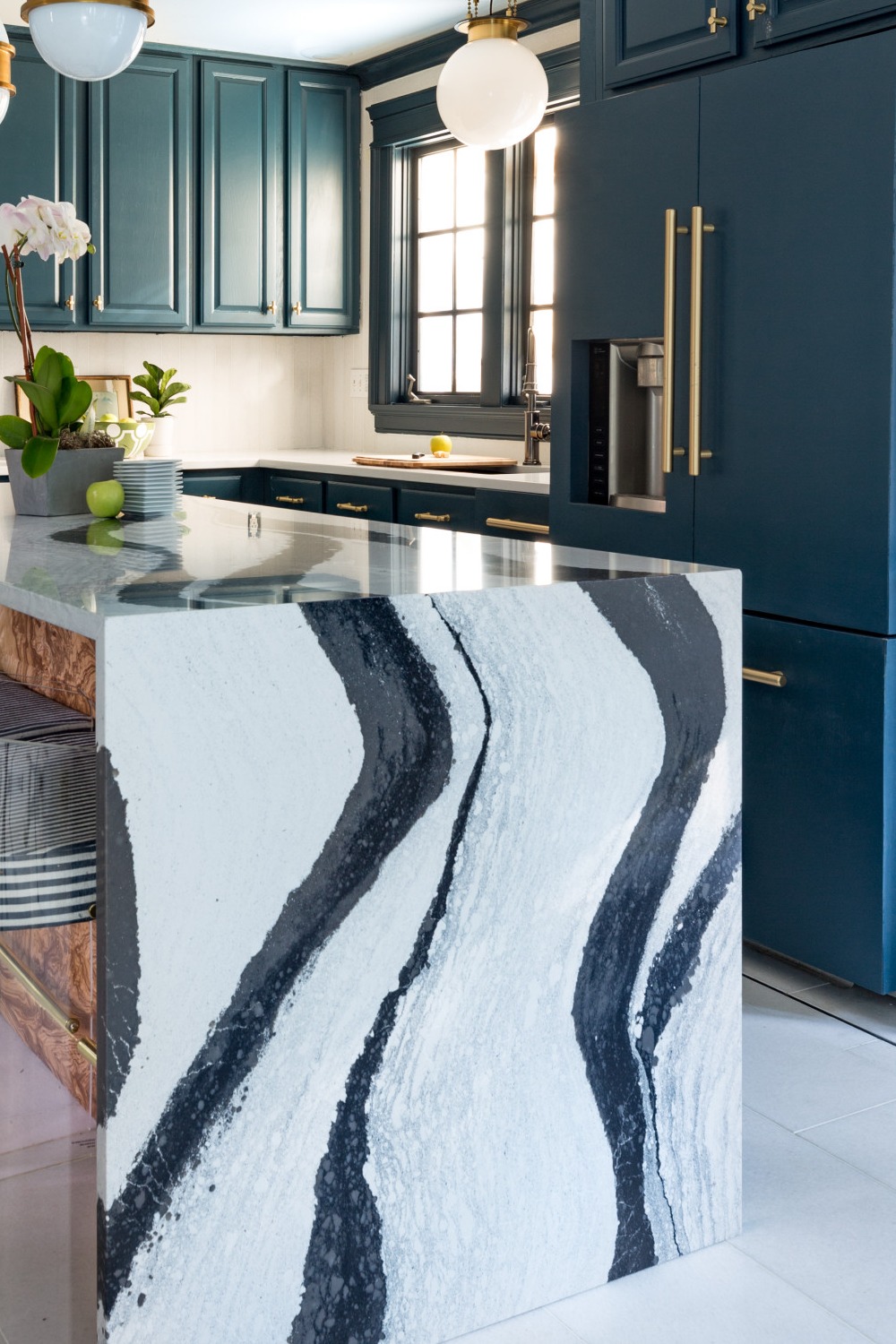 White Cambria Quartz Countertops Glossy Blue Cabinets Backsplash Porcelain Floor Tiles