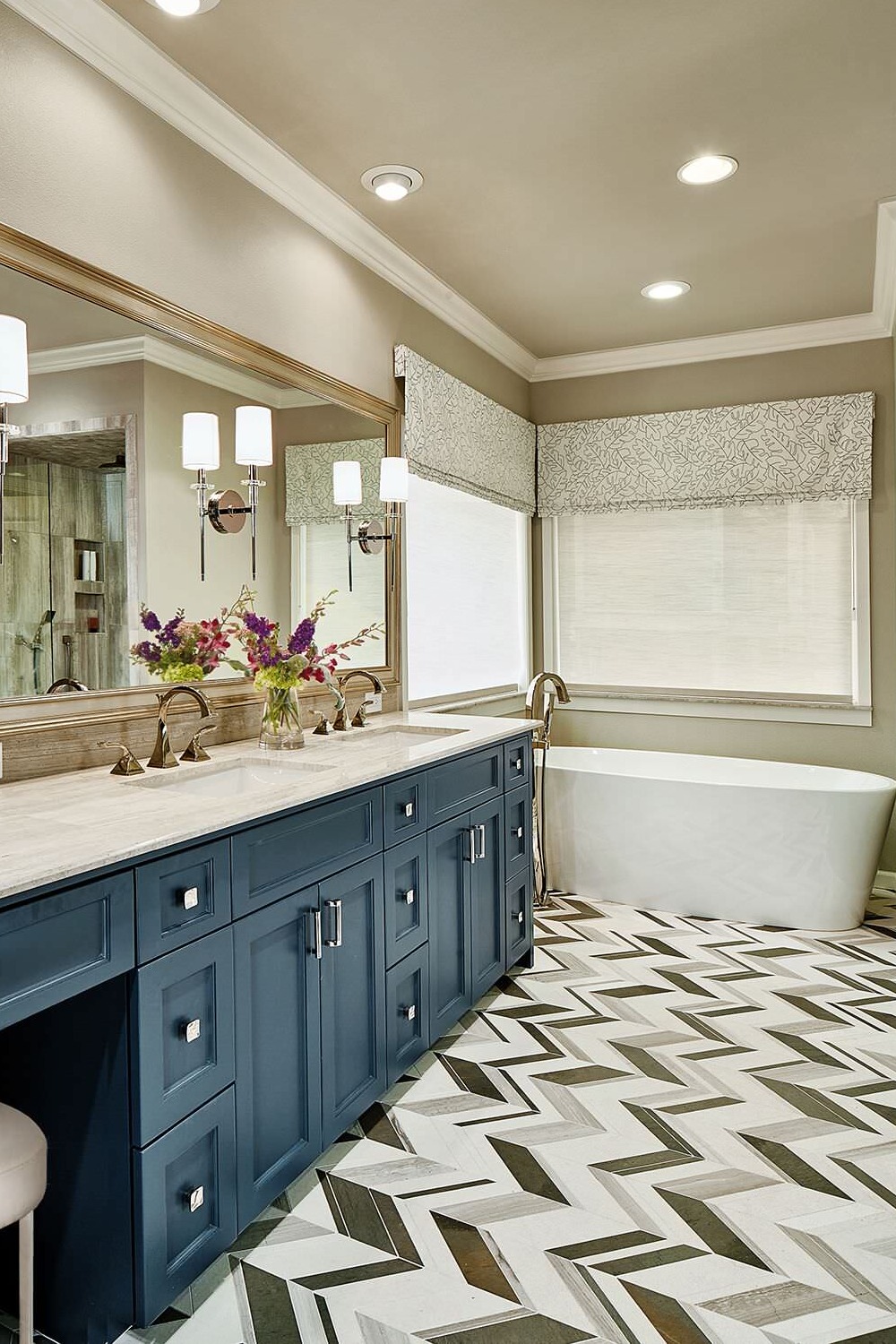 Blue Recessed Panel Cabinets Beige Granite Countertops Black White Floor Tiles Freestanding Bathtub