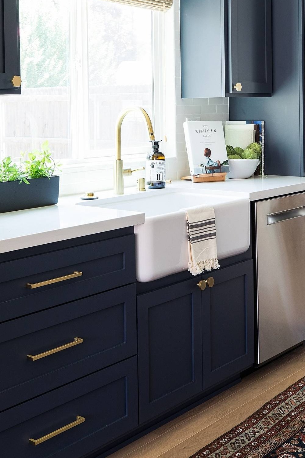 Blue Shaker Cabinets White Subway Backsplash Quartz Countertops Wood Floor Farmhouse Sink