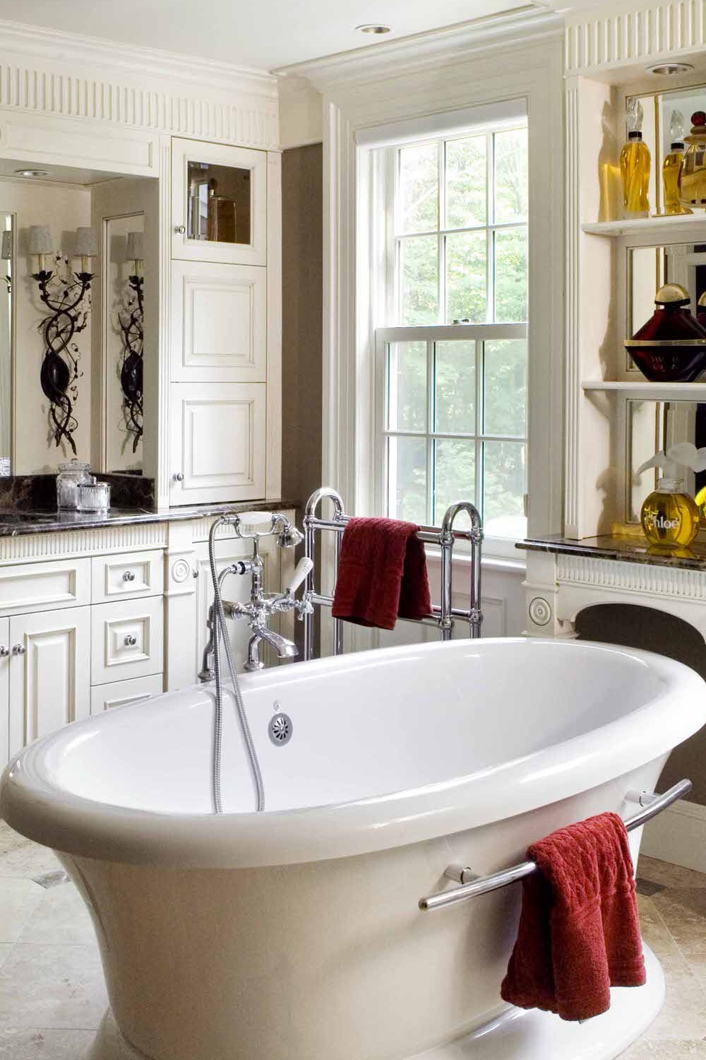 Cream Travertine Floor Tiles White Cabinets Black Countertops Free Standing Bathtub Towel Rack