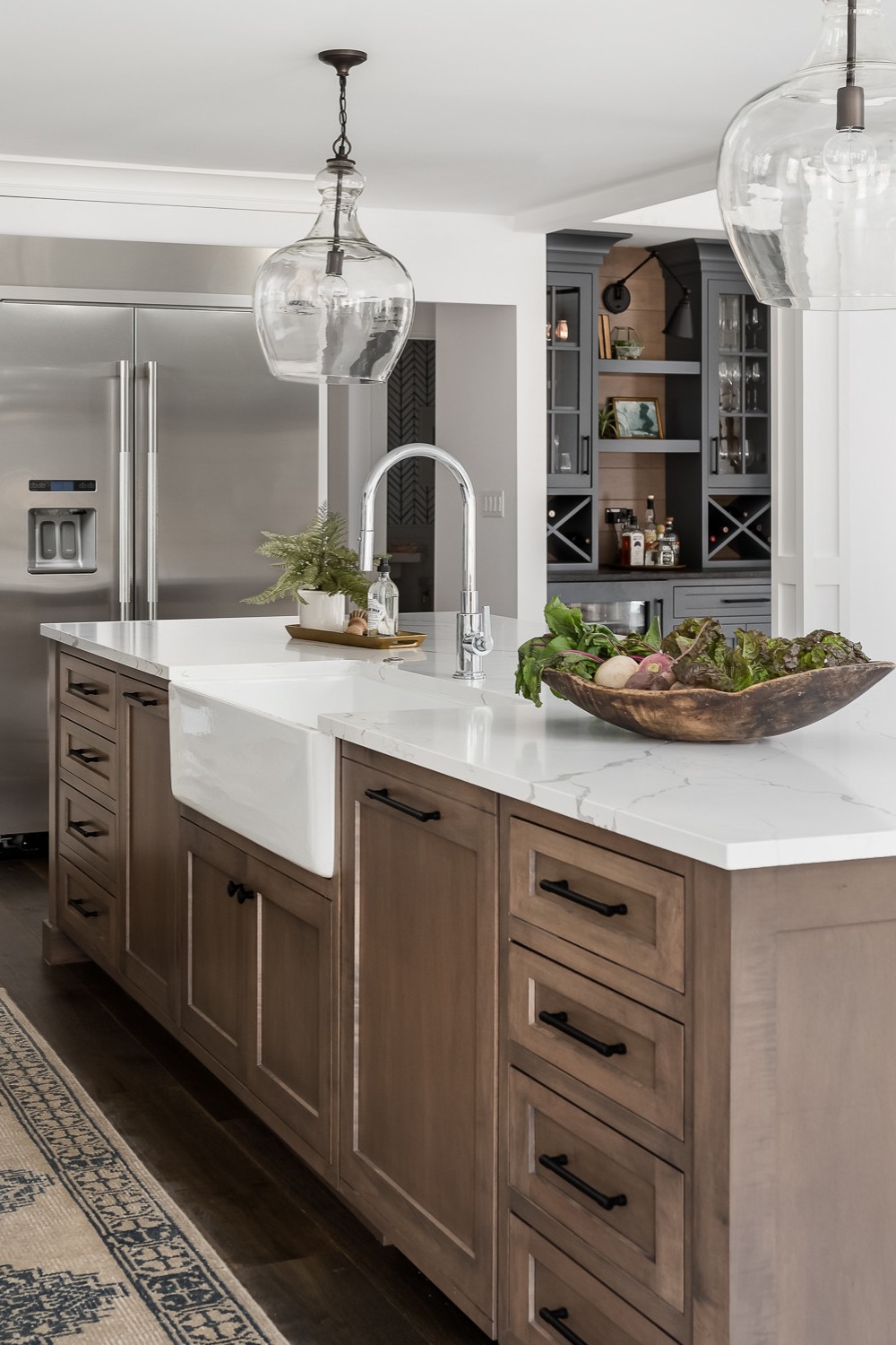 Dark Brown Wood Floor Shaker Cabinets White Quartz Countertops Farmhouse Sink