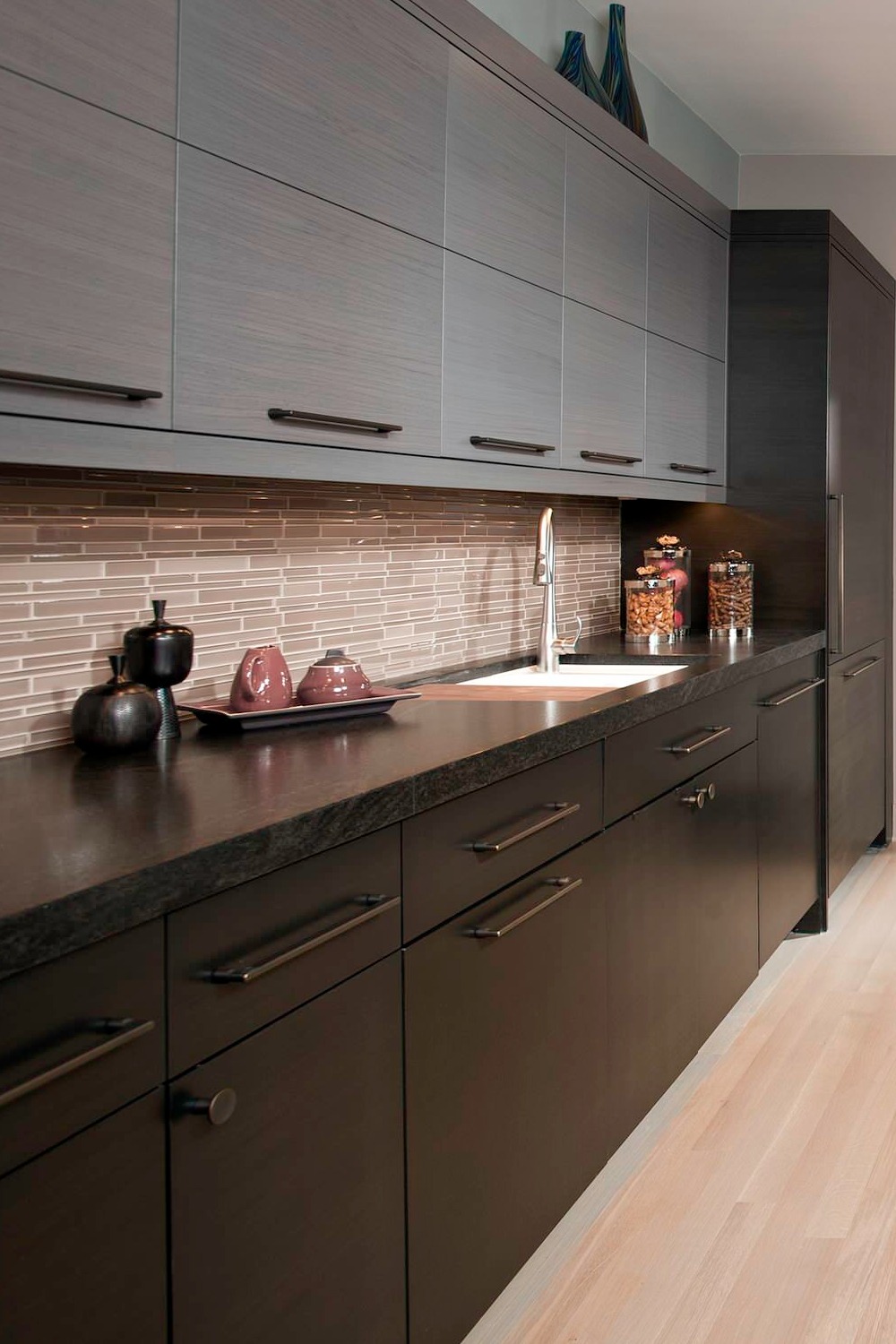 Flat Panel Gray Charcoal Cabinets Glass Taupe Matchstick Tile Backsplash Light Wood Floor Black Granite Countertops
