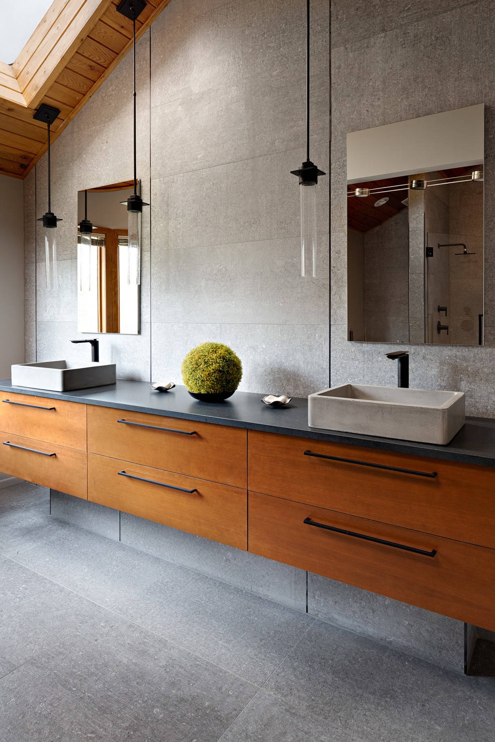 Gray Tiles Walls Vessel Sink Black Concrete Countertops Medium Tone Wood Cabinets