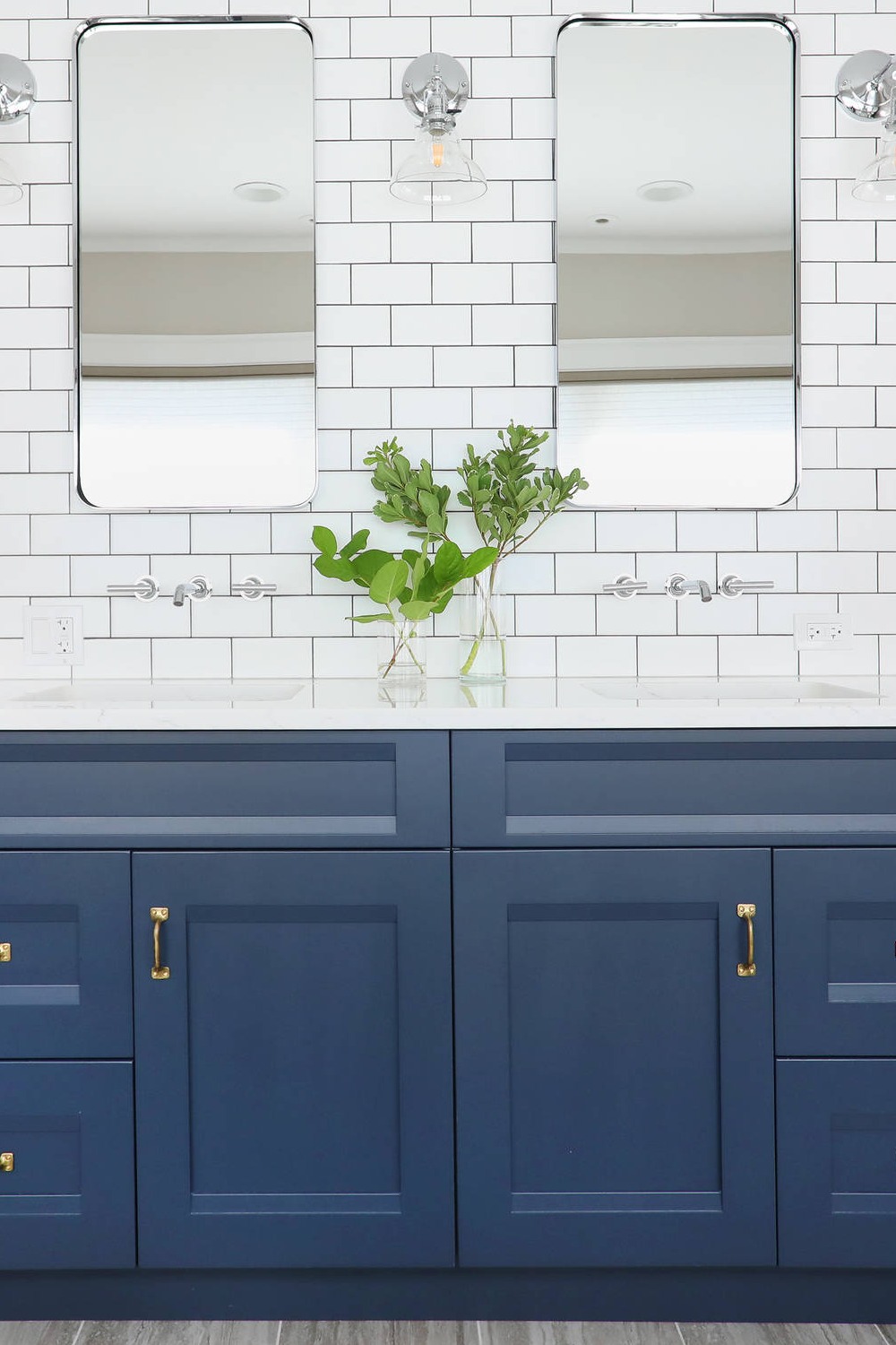Recessed Panel Blue Cabinets Quartz White Countertops Ceramic Porcelain Subway Tiles Gray Floor