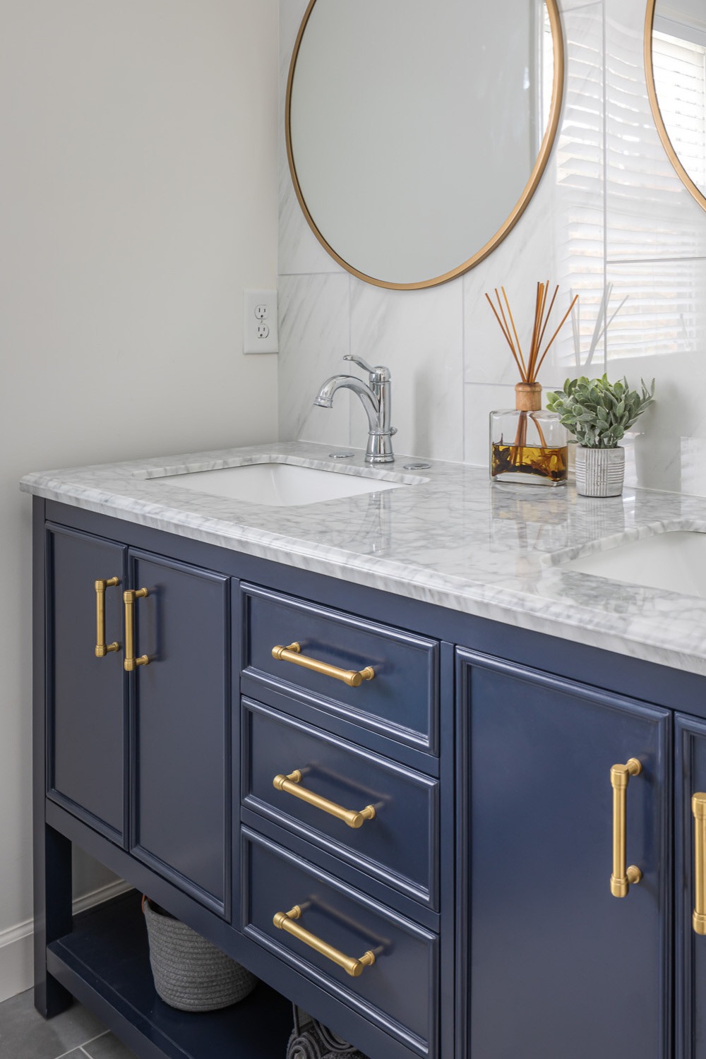 Super White Quartzite Countertops Blue Cabinets Porcelain Tile Backsplash Dark Gray Floor
