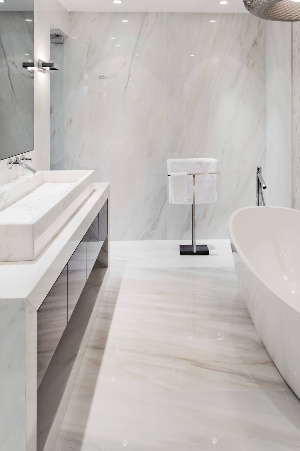 White Marble Countertops Flat Panel Brown Cabinets Floor Tiles Free Standing Towel Rack Bathtub