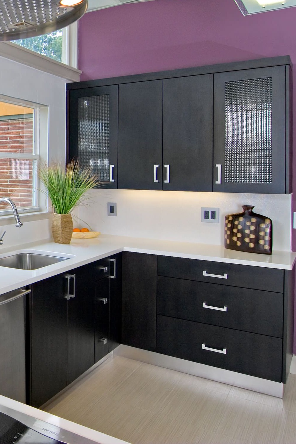 White Quartz Countertops Black Charcoal Flat Panel Cabinets Backsplash Beige Floor Tiles