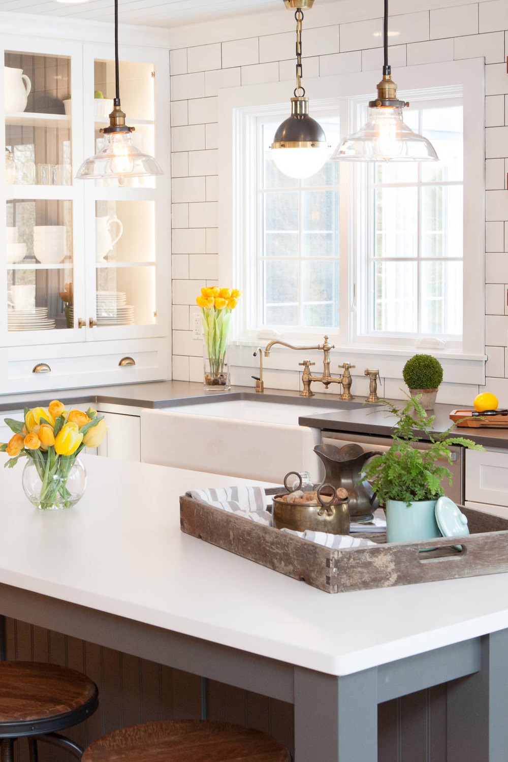 White Subway Tile Backsplash Quartz Countertops Farmhouse Sink Cabinets Wood Floor