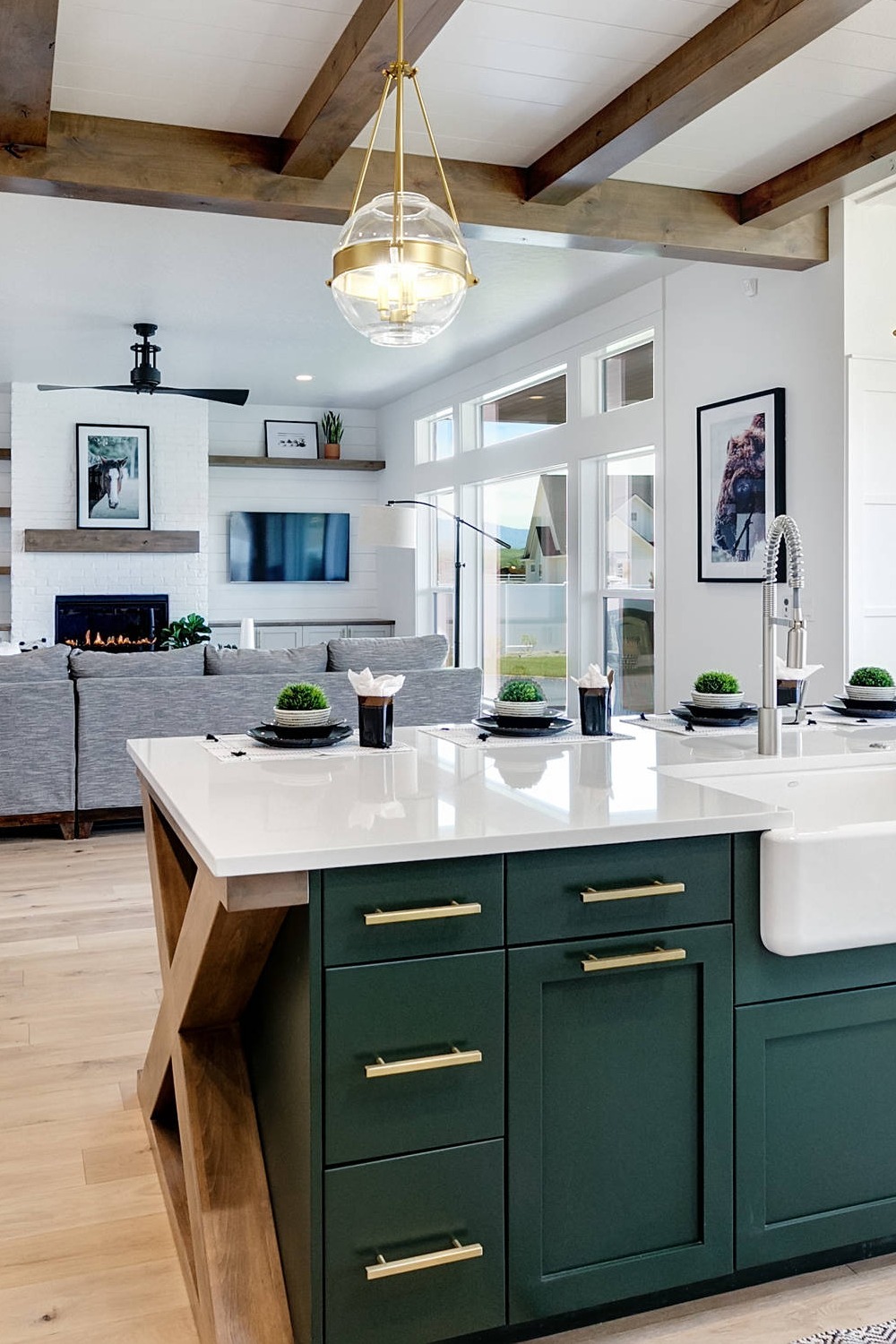 Light Wood Floor Shaker Green Cabinets White Quartz Countertops Farmhouse Sink Pendant Light Open Concept